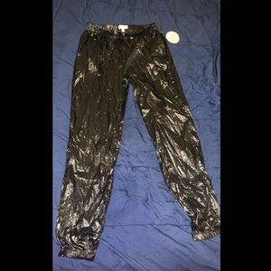 Brand new pair of Nylon Bungee Joggers. Size M never worn and stretchy 😇✨